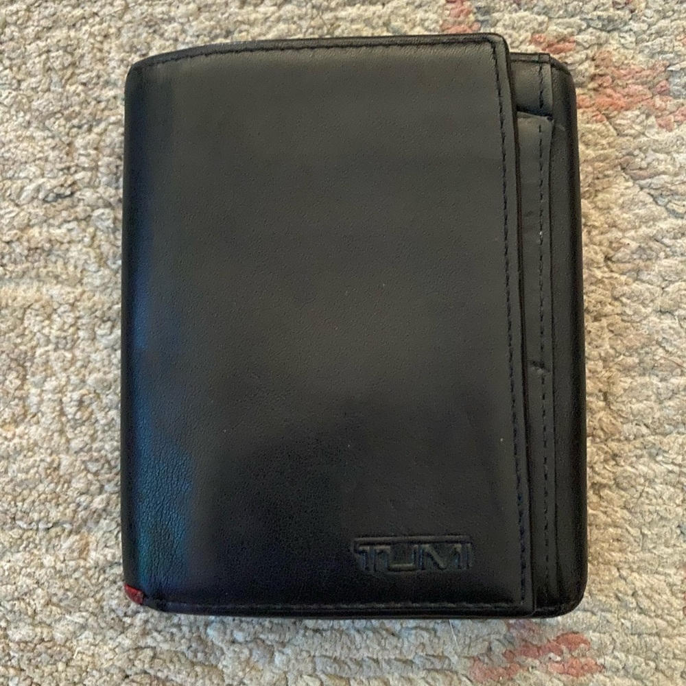 TUMI trifold leather wallet